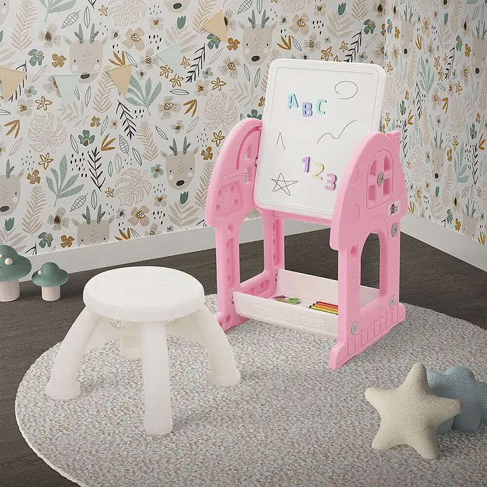 ECD Germany Kindertisch Bausteinplattentisch / Magnetische Whiteboard, Sitzhocker - Kunststoff, Rosa, Weiß - Ein pinkfarbener Kinder-Staffelei und weißer Plastikhocker auf einem runden Teppich. Die Staffelei hat eine weiße Tafel und ein Spielzeugregal.