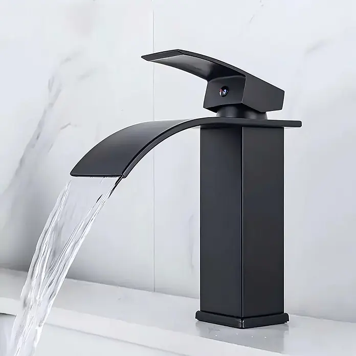 SONNENH Waschtischarmatur Schwarz, Edelstahl, Warm/Kalt, G3/8 -  - Moderner mattschwarzer Wasserfallhahn, aus dessen geschwungenem Auslauf Wasser fließt.