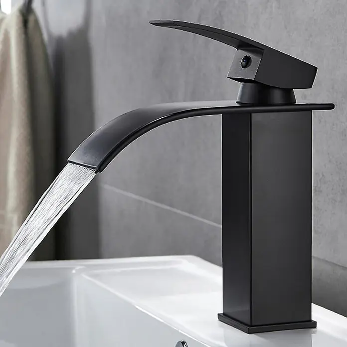 SONNENH Waschtischarmatur Schwarz, Edelstahl, Warm/Kalt, G3/8 -  - Schwarze matte Wasserfallarmatur, die Wasser in ein weißes Waschbecken abgibt.