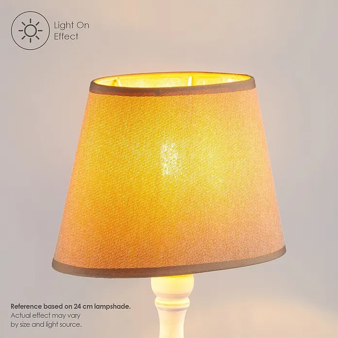 Home Sweet Home Lampenschirm Melrose - Ø x H: 14 x 16 cm, Taupe, Stoff, Oval - Beleuchteter 24 cm Stofflampenschirm, zeigt warmen Lichteffekt und texturiertes braunes Material.