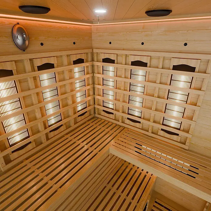 Artsauna Elementsauna - L x B x H: 150 x 150 x 200 cm - Innenansicht einer hellen Infrarotsauna aus Holz mit mehreren Heizpaneelen und Lattenbänken.