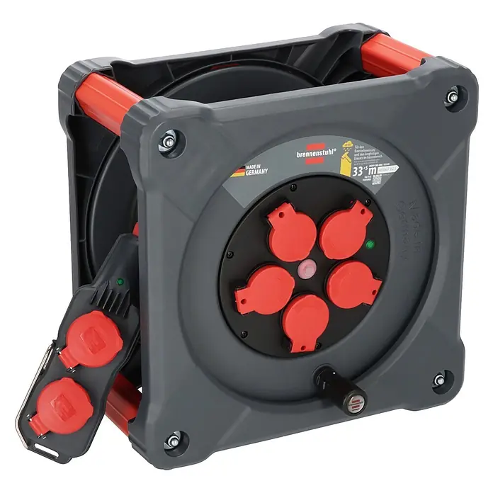 Brennenstuhl Kabeltrommel mit Powerblock KC 3200 5 - Kunststoff, 38 m, H07RN-F, IP44 - Graue brennenstuhl Kabeltrommel mit fünf roten Schutzkontaktsteckdosen, Wickelkurbel und separater Doppelsteckdose, ideal für den Baustelleneinsatz.