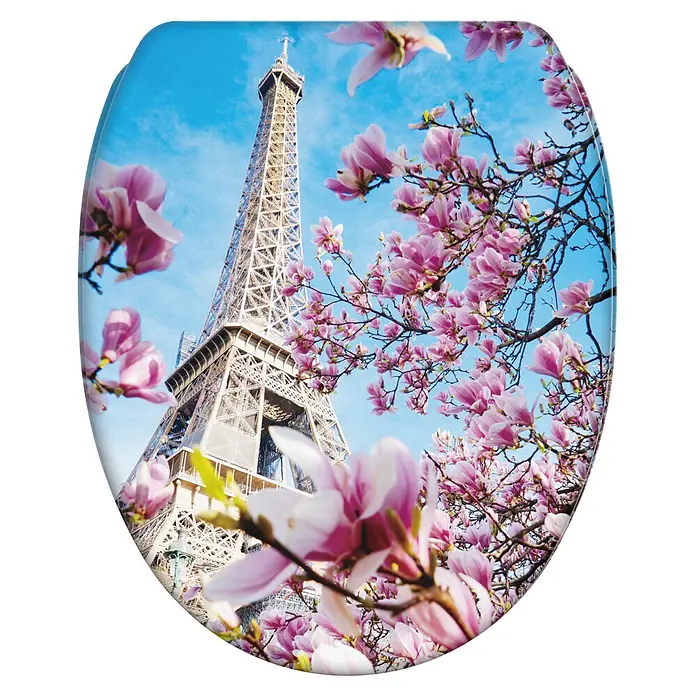 WC-Sitz mit Absenkautomatik & Top Fix Paris -  - Toilettensitz mit malerischem Druck des Eiffelturms vor blauem Himmel, umrahmt von leuchtenden rosa Magnolienblüten.