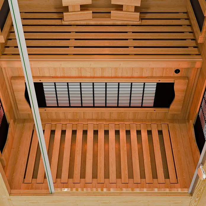 Infrarotkabine Kiruna90 Premium -  - Hölzernes Infrarotsauna-Interieur mit Lattenbänken, Boden und leuchtendem Heizpaneel.