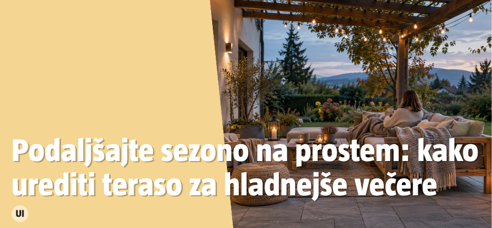 Prijetno osvetljena terasa z lesenim vrtni pohištvom v jesenskem večeru.