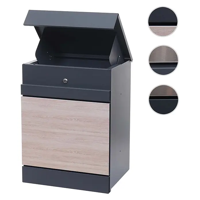 Mendler Paketkasten HWC-K41 Metall - verzinkt anthrazit-Holzoptik -  - Moderner dunkelgrauer Metallbriefkasten mit heller Holzoptik-Frontplatte, geöffnetem Einwurfschlitz und Schlüsselschloss.