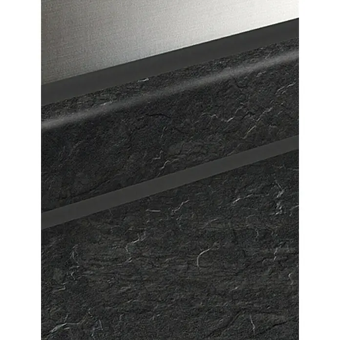 Resopal Copete - Raja negro, 60 cm - Primer plano que muestra una pieza con superficie gris y toques de piedra negra, creando una estética moderna.