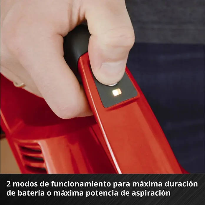 Einhell PXC 18V Batería - 18 V, 4 Ah - Herramienta roja con mano pulsando botón de modo iluminado para duración de batería o potencia de succión.
