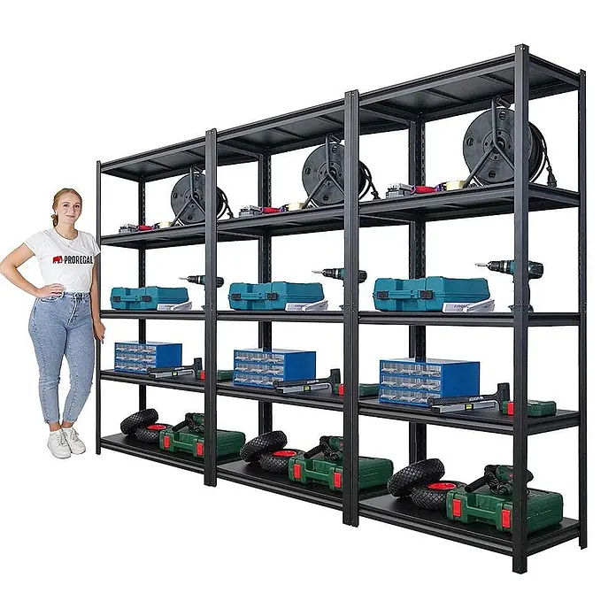 Mega Deal | 3x Schwerlastregal Thorin| HxBxT 180x90x40cm | Fachlast 350 kg | Schwarz -  - Hohe, schwarze Metallregale, gefüllt mit Werkzeugen und Geräten, mit einer Frau daneben zur Größenreferenz.