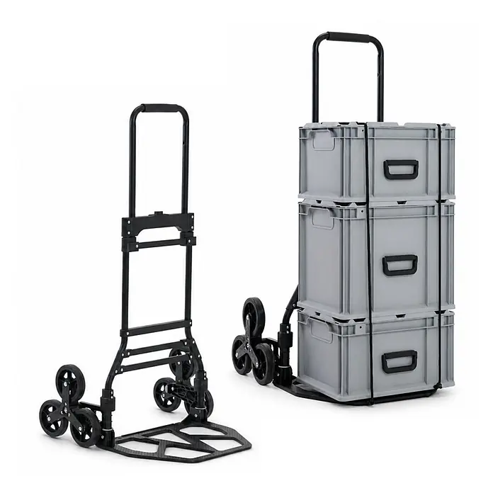 Klappbare Alu-Treppensackkarre ELEPHANT | Traglast 150kg | HxBxT 112x49x58cm | Aluminiumrahmen, ergonomische Griffe, pannensichere Vollgummibereifung | Schwarz | Treppensteiger Transportkarre Staplerkarre -  - Schwarze klappbare Sackkarre mit Treppensteiger-Rädern, leer und beladen mit drei grauen Kisten mit Spanngurten.