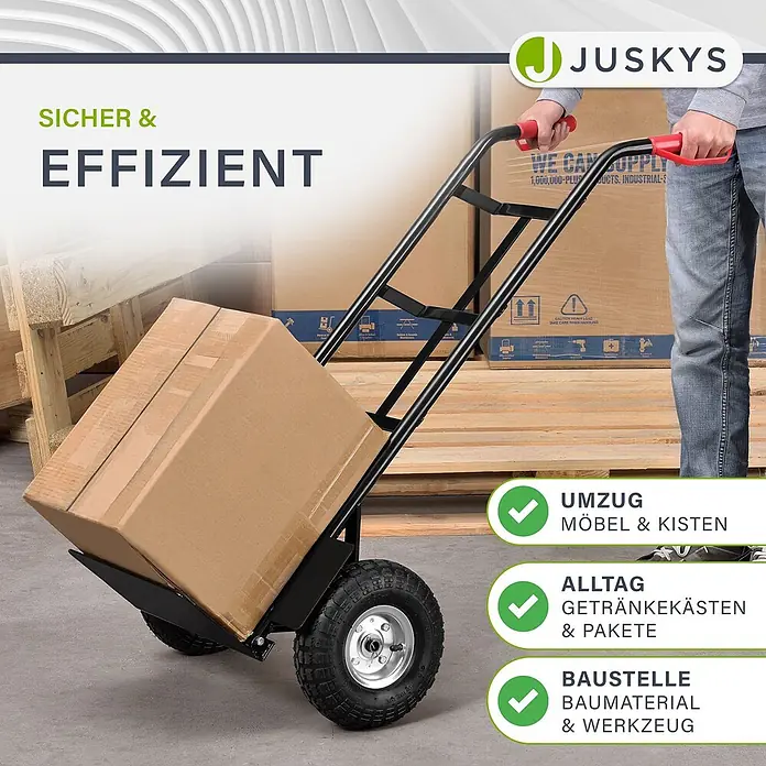 Sackkarre Basic in schwarz mit roten Griffen klappbar -  - Eine schwarze Sackkarre mit roten Griffen transportiert einen Karton, bedient von einer Person im Lager.