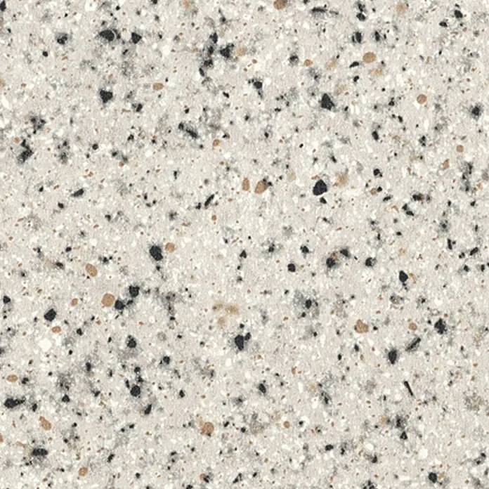 Resopal Canto de PVC - Arctic Melange, 182 x 4,4 cm - Un primer plano de una encimera de terrazo con manchas claras y oscuras.