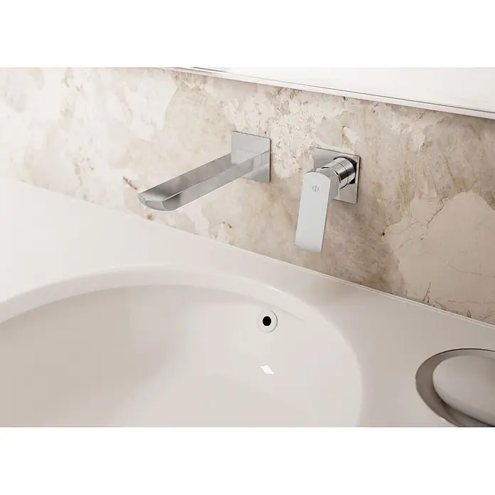 IO Grifo de lavabo empotrado Marriot - Cromo - Grifo de pared cromado con monomando sobre un lavabo blanco.