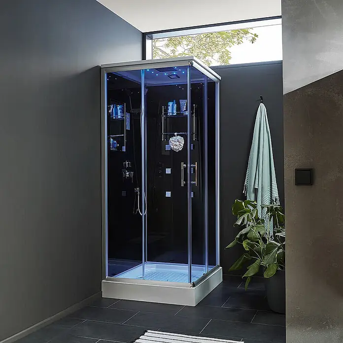 Home Deluxe Duschkabine WAVE M -  - Moderne Duschkabine mit dunklen Paneelen und blauen LED-Leuchten in einem stilvollen Badezimmer.
