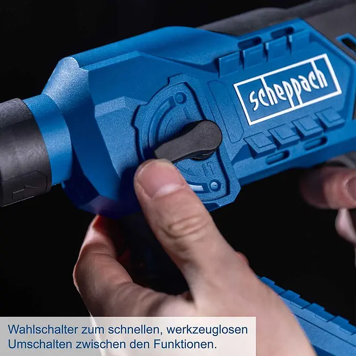 Scheppach IXES 20V Akku-Bohrhammer C-RHD130-X - 20 V, Ohne Akku, 1,3 J - Eine Hand betätigt den schwarzen Wahlschalter eines blauen Scheppach Elektrowerkzeugs für schnellen, werkzeuglosen Funktionswechsel.