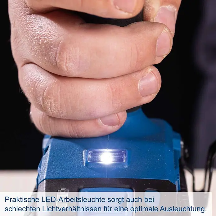 Scheppach IXES 20V Akku-Schlagbohrschrauber BC-CD60-X - 20 V, Ohne Akku, 60 Nm - Hand hält blaues Elektrowerkzeug mit leuchtender LED-Arbeitsleuchte.