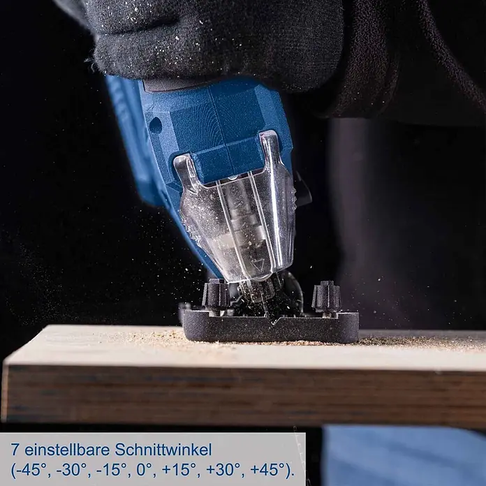 Scheppach IXES 20V Akku-Pendelhubstichsäge C-JS220-X - 20 V, Li-Ionen, Anzahl Akkus: Ohne Akku, Leerlaufhubzahl: 0 /min - 2.400 /min - Eine behandschuhte Hand bedient eine blaue Stichsäge, die Holz schneidet und Sägemehl erzeugt.