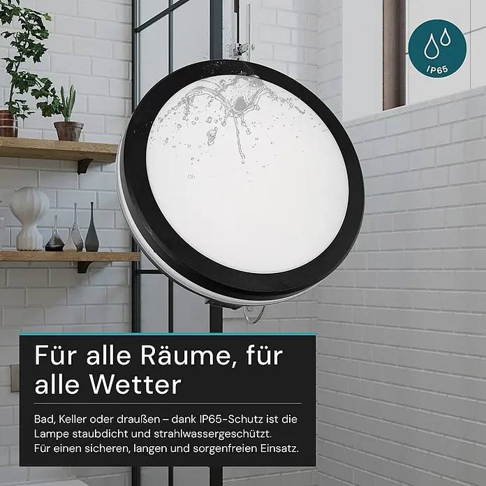 Luxula LED-Deckenleuchte rund - 30 W, Schwarz, Mehrfarbig - Runde schwarz-weiße IP65-Leuchte mit Wasserspritzern, die ihre Wasserdichtigkeit in einer Badumgebung zeigt.