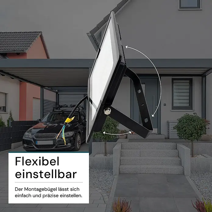 Luxula LED-Strahler - 150 W, 15.000 lm, 3.000 K, IP65 - Schwarzer Flutlichtstrahler mit verstellbarem Montagebügel, im Freien gezeigt. Der Bügel ermöglicht präzise Winkeleinstellung.