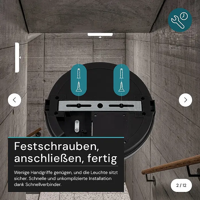 Luxula LED-Deckenleuchte rund - 20 W, Schwarz, Mehrfarbig - Runder, schwarzer Leuchtenfuß mit Montagebügel, an Betonwand installiert. Installationsanker sind eingezeichnet.