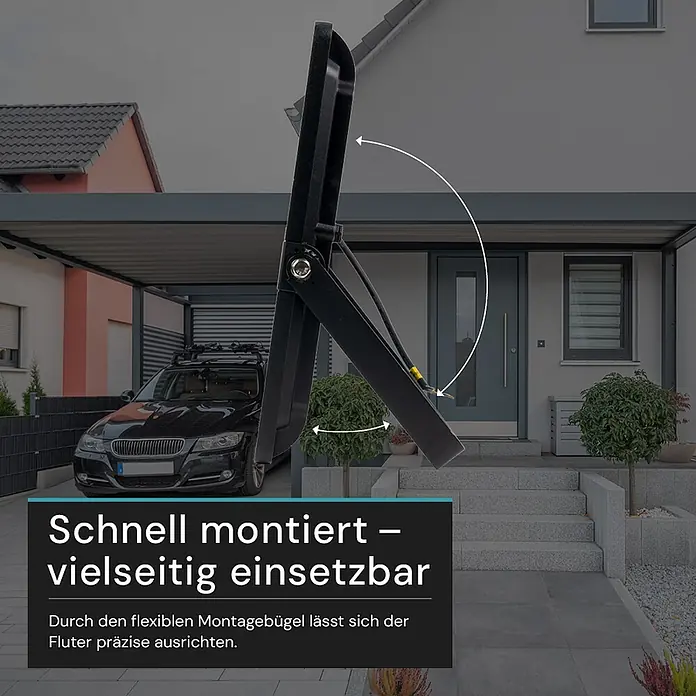 Luxula LED-Strahler - 300 W, 30.000 lm, IP65 - Schwarzer Fluter mit verstellbarem Montagebügel, der eine präzise Ausrichtung ermöglicht, draußen vor einem Haus.