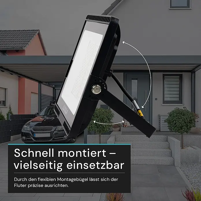 Luxula LED-Strahler - 100 W, 10.000 lm, IP65 - Schwarzer LED-Fluter im Außenbereich, angewinkelt durch flexible Montagehalterung zur präzisen Ausrichtung.