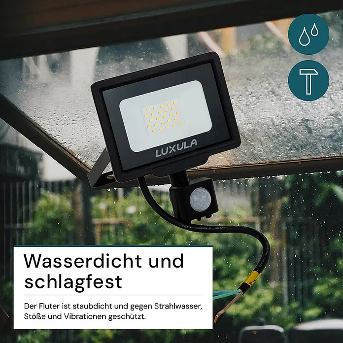Luxula LED-Strahler Fluter Bewegungsmelder 20W 3000K Warmweiß 2000lm -  - Schwarzer Outdoor-LED-Strahler mit Bewegungsmelder, nass, um sein wasser- und schlagfestes Design hervorzuheben.
