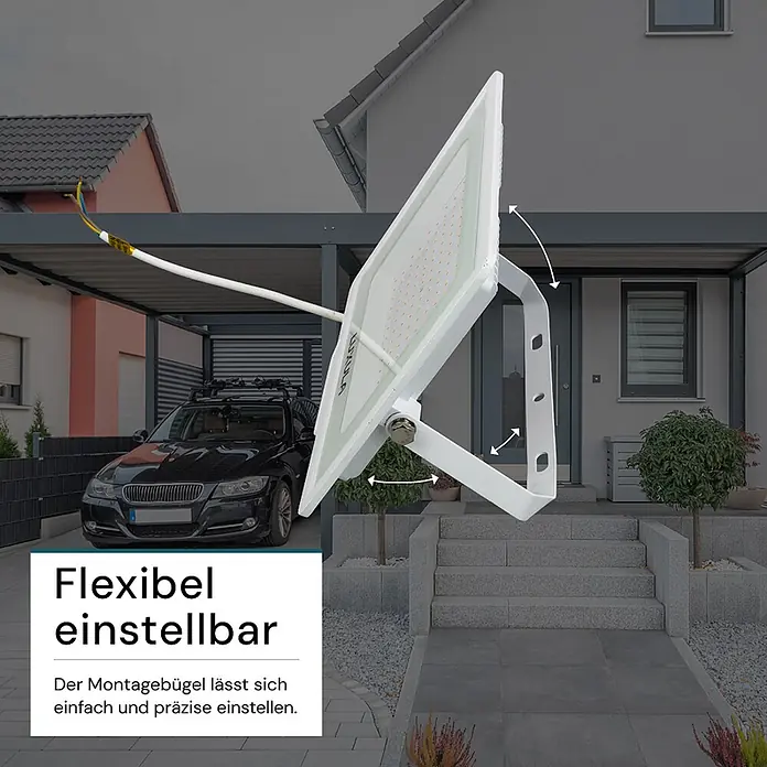 Luxula LED-Strahler - 100 W, 10.000 lm, IP65 - Weißer LED-Flutlichtstrahler mit verstellbarem Montagebügel, draußen vor einem Haus.