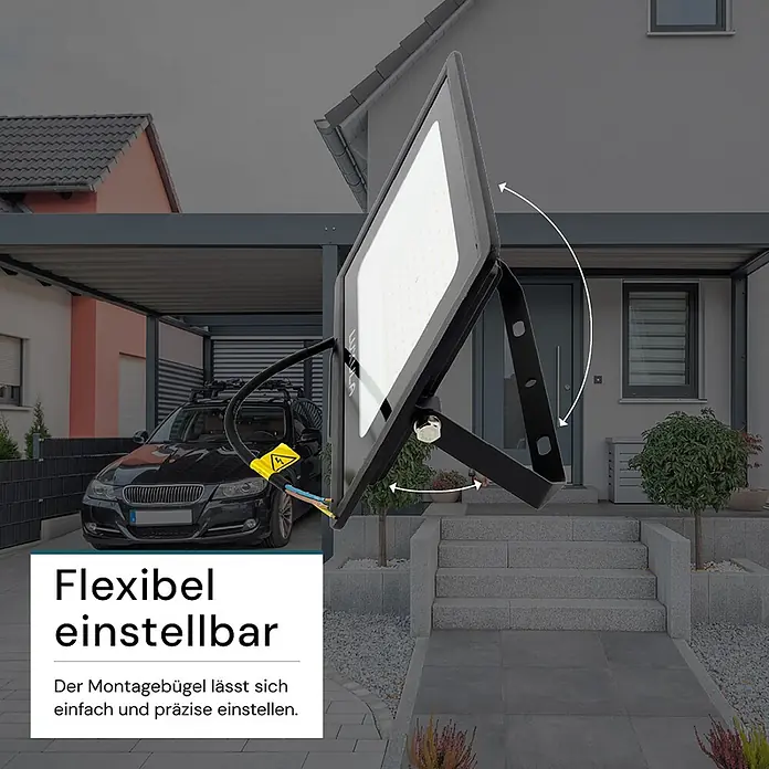 Luxula LED-Strahler - 100 W, 10.000 lm, 4.000 K, IP65 - Schwarzer LED-Flutlichtstrahler mit verstellbarem Montagebügel, geneigt zur Demonstration der Flexibilität in einer Außenumgebung.