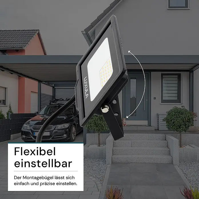 Luxula LED-Strahler - 20 W, 2.000 lm, 4.000 K, IP65 - Verstellbarer schwarzer LED-Fluter mit flexiblem Montagebügel, im Außenbereich gezeigt.