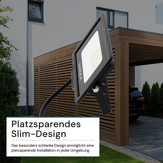 Luxula LED-Strahler - 20 W, 2.000 lm, 3.000 K, IP65 - Schwarzer LUXULA LED-Flutstrahler mit schlankem Design, im Außenbereich platziert für platzsparende Installation.