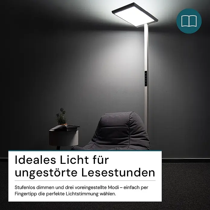 Luxula LED-Stehleuchte 100W 7000lm Bürostehleuchte Up- Downlight -  - Eine moderne graue Stehleuchte erhellt eine gemütliche Leseecke mit Sitzsack und Buch auf einem Beistelltisch.