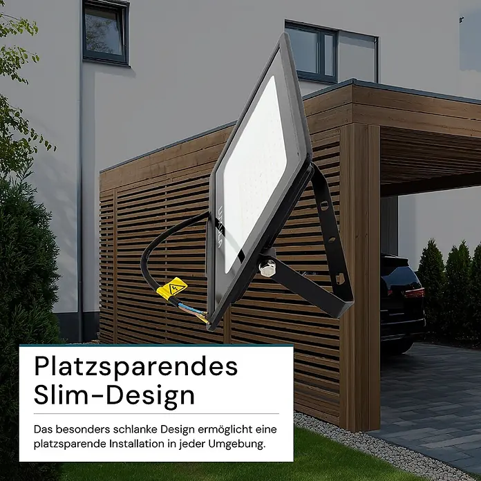 Luxula LED-Strahler - 100 W, 10.000 lm, 4.000 K, IP65 - Schwarzer schlanker LED-Fluter mit offenem Kabel in einer Außenumgebung zur Installation.