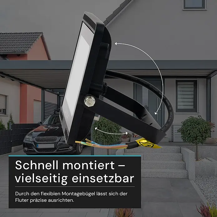 Luxula LED-Strahler - 50 W, 5.000 lm, IP65 - Schwarzer LED-Fluter mit verstellbarem Montagebügel, draußen gezeigt, zur präzisen Ausrichtung.