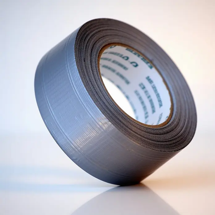 ALLEGRA Gewebeband - 72 mm x 50 m, silber - Rolle graues Gewebeband mit texturierter Oberfläche, schräg dargestellt.