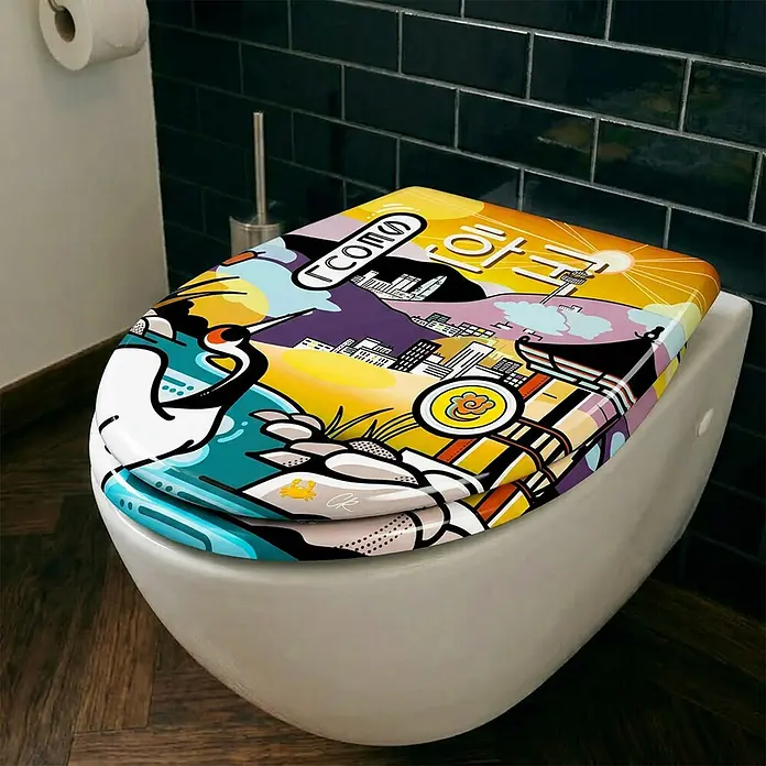 Wodea WC-Sitz   -  Seoul -  - Bunter, künstlerischer Toilettensitz mit Stadtbild und 'Seoul'-Text, auf einer weißen Toilette in einem modernen Bad.