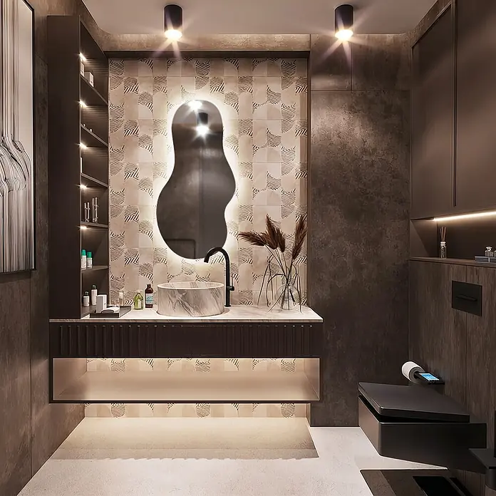 Unregelmäßiger LED-Spiegel -  - Elegantes, dunkel getöntes modernes Bad mit beleuchtetem organischem Spiegel, Marmorwaschbecken und schwebender Smart-Toilette.