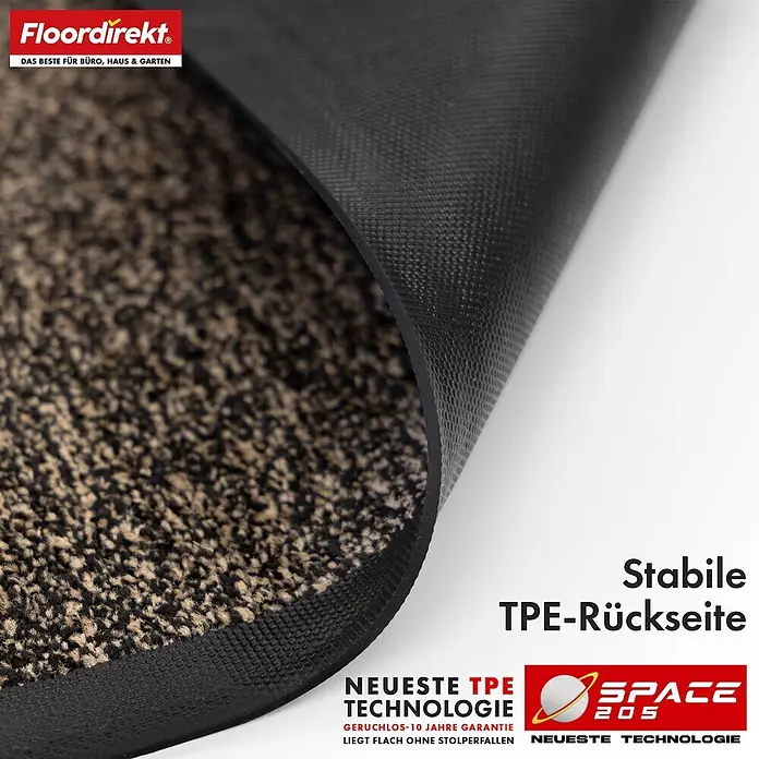 Floordirekt Fußmatte Space 205 - Rutschfeste Türmatte - Ocker - 60 x 90 cm - Beige, Material Nutzschicht: Polypropylen - Nahaufnahme einer braun-beige gesprenkelten Fußmatte mit Faseroberfläche und stabiler, schwarzer TPE-Rückseite.