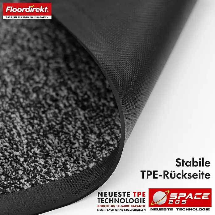 Floordirekt Fußmatte Space 205 - Rutschfeste Türmatte - Anthrazit - 200 x 300 cm - Anthrazit, Material Nutzschicht: Polypropylen - Schwarz-graue Fußmatte mit angehobener Ecke, die die stabile, strukturierte schwarze TPE-Rückseite zeigt.