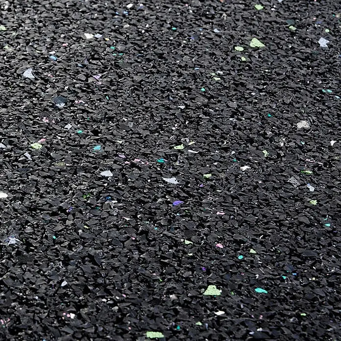 Floordirekt Antivibrationsmatte 60 x 60 x 1 cm -  - Nahaufnahme von schwarzem Recycling-Gummiboden mit bunten Sprenkeln, geeignet für Sicherheitsbeläge.
