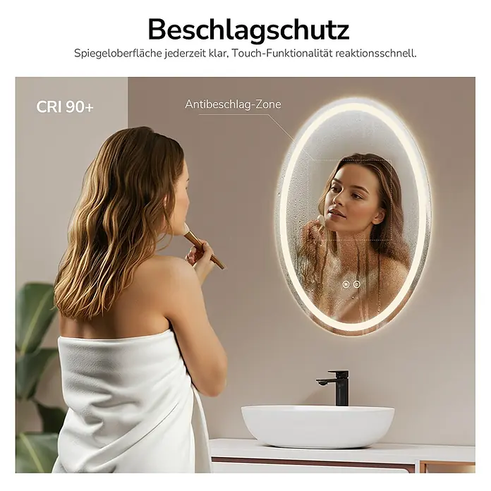 Lichtspiegel Glowrim OLM19 -  - Ovaler LED-Spiegel mit Antibeschlagfunktion. Eine Frau schminkt sich vor dem klaren, beleuchteten Spiegel.