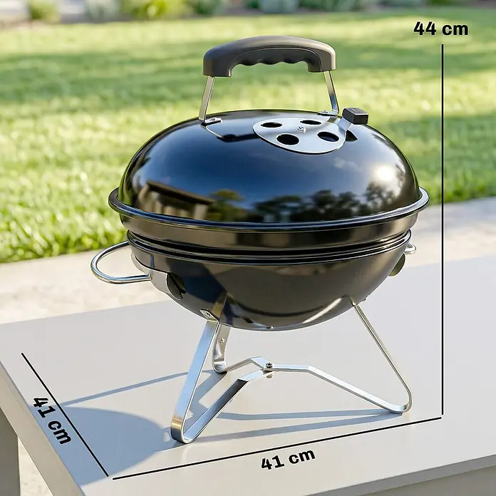 Outsunny-Kugelgrill-Ø41 x 44H cm -  - Schwarzer tragbarer Grill mit Griff und Deckel, auf einem Tisch im Freien. Maße: 44 cm hoch, 41 cm breit.