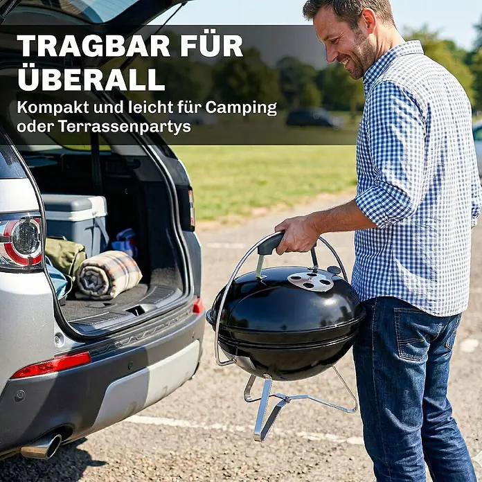 Outsunny-Kugelgrill-Ø41 x 44H cm -  - Ein Mann trägt einen schwarzen tragbaren Grill, bereit für Camping oder Terrassenpartys.