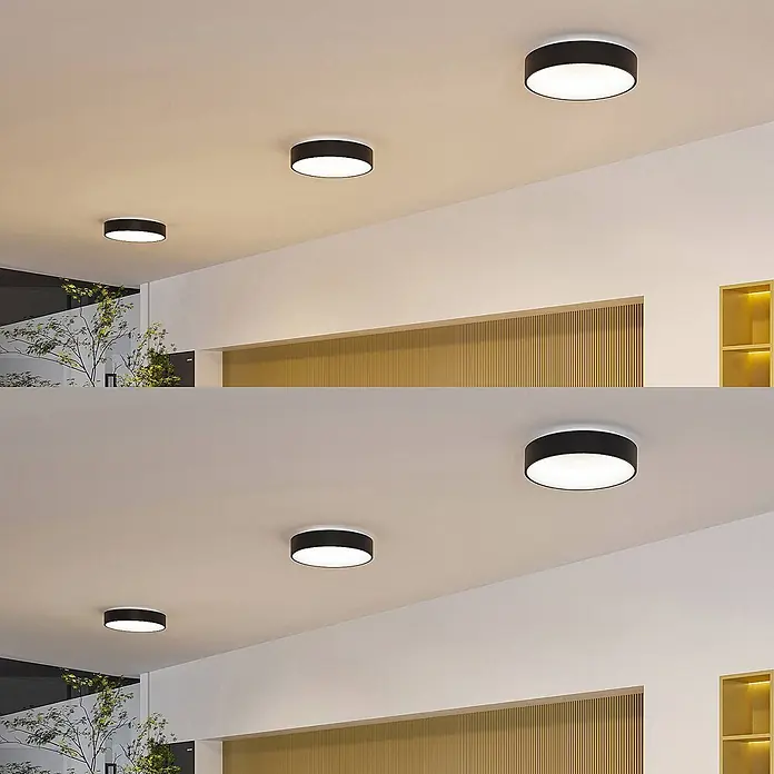 Arcchio LED Deckenlampe in schwarz, weiß, Deckenleuchte rund -  - Schwarz-weiße Deckenleuchten in einem Raum, zeigen warmes und kühles Licht.