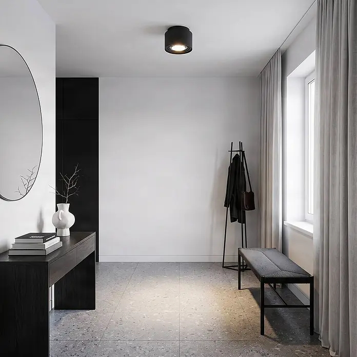 Arcchio Deckenlampe in schwarz, Deckenstrahler -  - Schwarzer zylindrischer Deckenstrahler beleuchtet modernen Flur.
