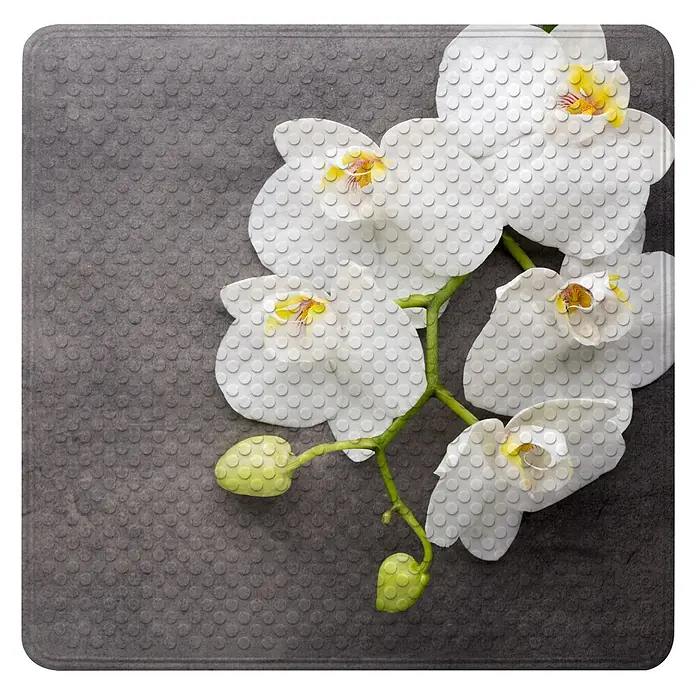 Badematte Pretty -  - Graues strukturiertes Tischset mit weißem Orchideenmuster.