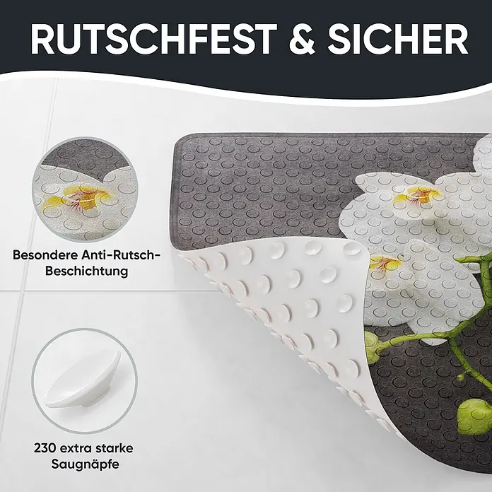 Badematte Pretty -  - Dunkelgraue Badematte mit weißem Orchideenmuster und strukturierter Anti-Rutsch-Oberfläche, zeigt Saugnäpfe auf der Unterseite.
