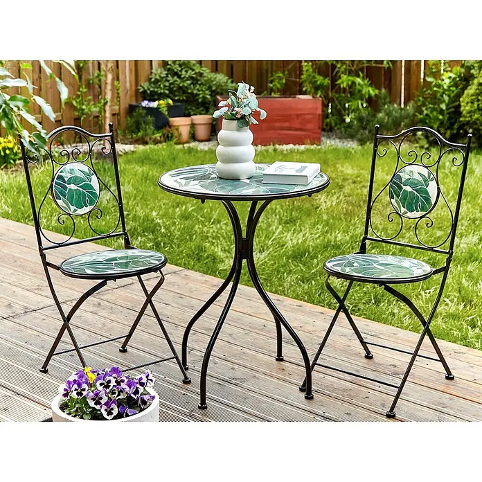 2-tlg Bistro Set COZZANA in Schwarz/Grün -  - Outdoor-Bistro-Set mit schwarzem Metallgestell und grünem Blattmosaikmuster auf Tisch und zwei Stühlen.