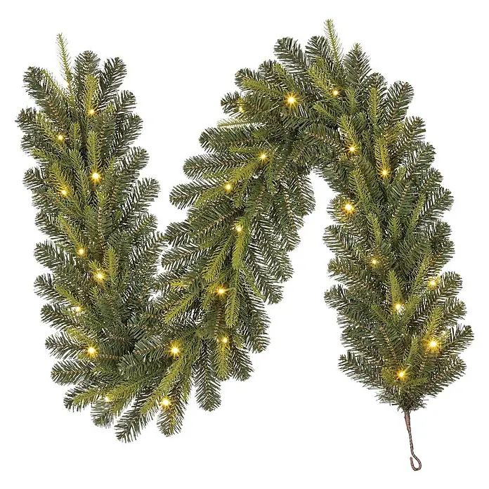 Guirnalda decorativa Grimshaw con LED - Plástico, Verde, Largo: 180 cm - Guirnalda de Navidad artificial verde preiluminada con luces LED blancas cálidas.