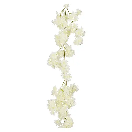 Guirnalda decorativa con flores crema